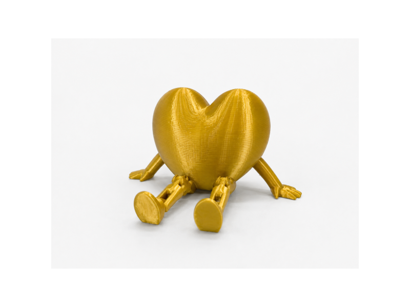 Inima decorativa articulata, 9x6x4 cm, cadou pentru cineva drag, orice ocazie, picioruse miscatoare, plastic, auriu Inima decorativa articulata, 9x6x4 cm, cadou pentru cineva drag, orice ocazie, picioruse miscatoare, plastic, auriu