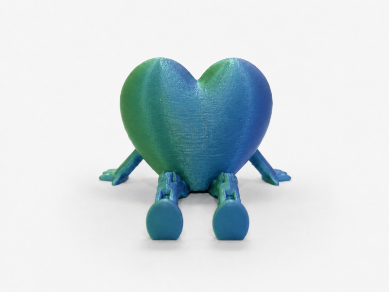 Inima decorativa articulata, 9x6x4 cm, cadou pentru cineva drag, orice ocazie, picioruse miscatoare, plastic, verde-albastru Inima decorativa articulata, 9x6x4 cm, cadou pentru cineva drag, orice ocazie, picioruse miscatoare, plastic, verde-albastru